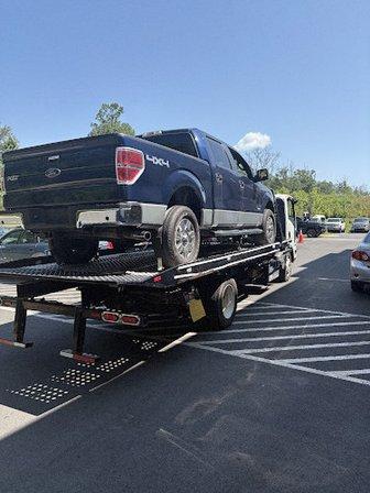 ROUMANI AUTO AND TOWING LLC