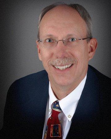 John W. Dresely, Jr. O.D., F.C.O.V.D.